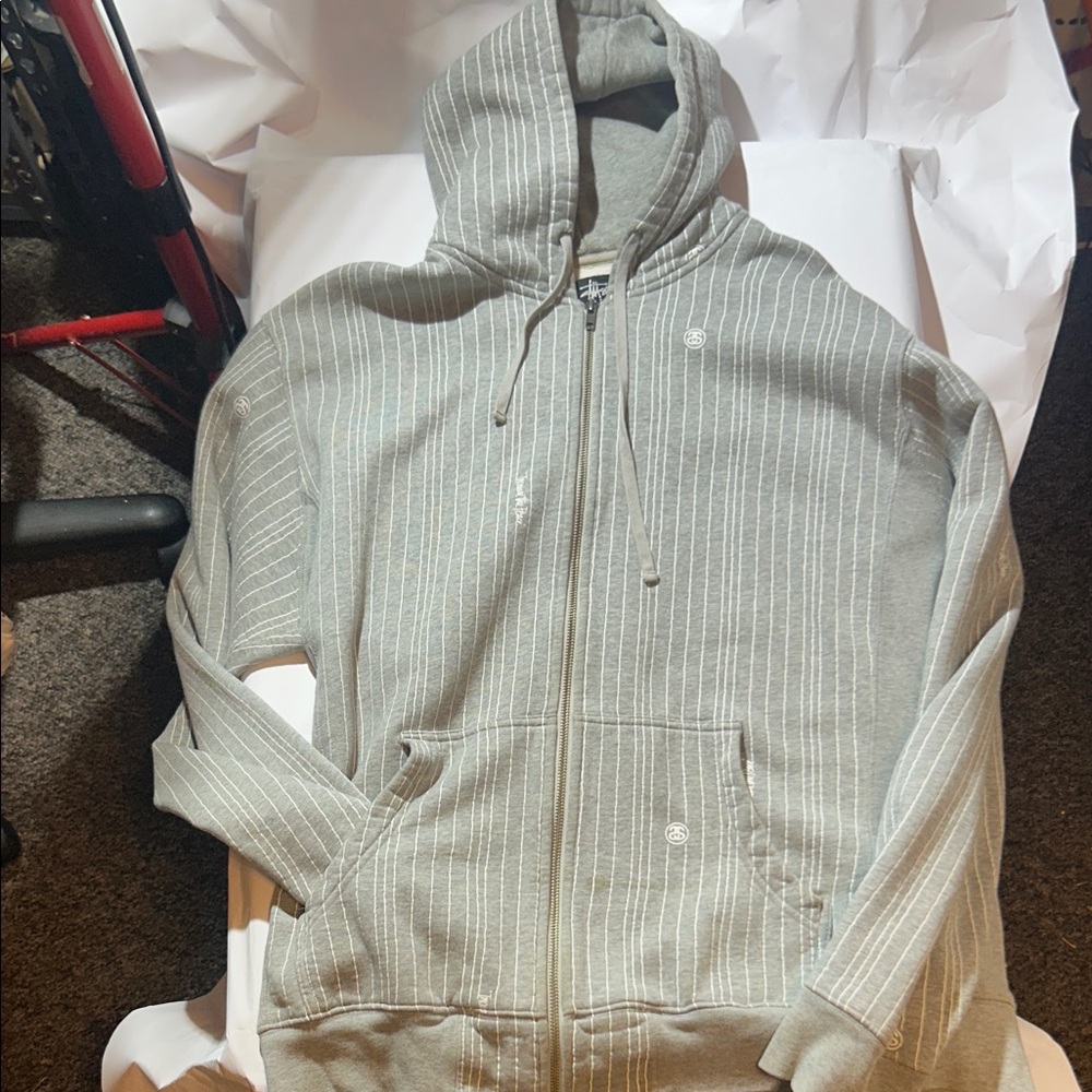 Stüssy - “Increase the Peace” Gray 
/White Striped Zip-Up Hoodie (Minor Stain)